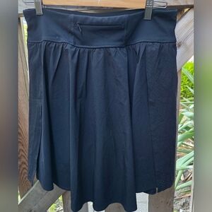 Spanx Black Skort With Zippered Pocket/ Fast Drying Light Breathable Fabric. Lg